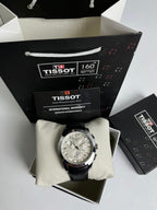 Tissot – Black Leather Strap, White Dial