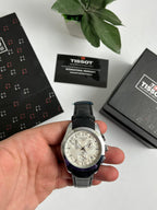 Tissot – Black Leather Strap, White Dial